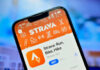 Close-up of a smartphone displaying the Strava fitness app