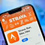 Close-up of a smartphone displaying the Strava fitness app