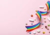 Viagra’s Hidden Role in Saving Kids’ Lives Colorful pills and a rainbow ribbon on a pink background