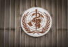 World Health Assembly’s SHOCKING TB Admission World Health Organization emblem featuring a globe and caduceus