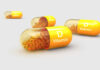 Vitamin D’s Surprising Role in Surgery Pain Vitamin D capsules with orange beads inside