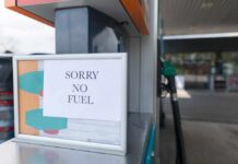 Too Close To Gas Pumps? Leukemia Clue Sign at a gas station indicating no fuel available