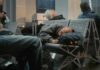 Sleep Pattern That TRIPLES Dementia Risk! Passengers sleeping on airport benches with luggage nearby