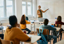 How ‘Praising Intelligence’ may sabotage kids Teacher explaining a math concept to students in a classroom