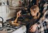 Kitchen Reheat Mistake Creates Cancer Chemicals Child cooking with adult at a stove
