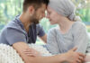 Marriage Drift? One Habit Stops It A couple sharing a tender moment, foreheads touching, in a cozy setting