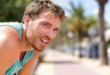 Impact of Extreme Heat on Your Brain man in athletic tank top resting outdoors