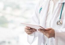 Heart Risk Prediction: BMI vs. Body Fat Doctor with stethoscope using a tablet