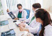 Everyday Habit That Keeps Your Lungs Strong Doctors reviewing chest X-ray at a workstation