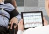 New Way To Screen For Prediabetes Doesn’t Require Blood Test Technician reviews polygraph readings on a tablet beside a seated subject