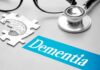 Wartime Diet That Slashed Dementia Risk Stethoscope and brain puzzle piece on desk