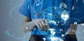Healthcare professional using a digital tablet with medical data icons