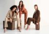 Monthly Face-Lifts? Inside Korea’s Look Tax Three women in tailored suits posing on vintage suitcases