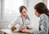Doctors’ Playbook Beats Arthritis Knee Pain Doctor consulting a patient at a desk