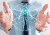 Holographic human figure with orbiting lines between open hands