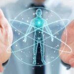 Holographic human figure with orbiting lines between open hands