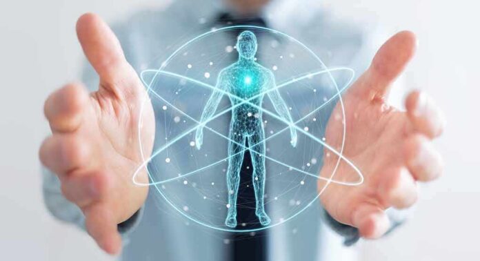 Holographic human figure with orbiting lines between open hands