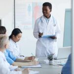 Doctor leading a meeting with medical team in a conference room