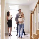 Stairs Hack Eases Knee Agony Nick Nanton and a couple with a baby tour a bright home entryway